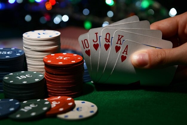 Mobile phone showing sohib account balance and live blackjack table